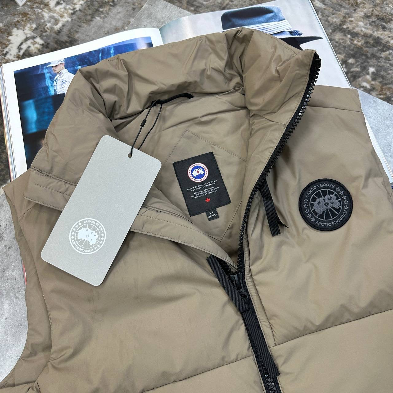 CNDA GOSE BLACKBADGE BODYWARMER BEIGE